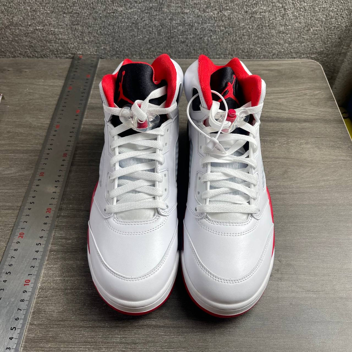 AJ5 Fire Red Black Tongue