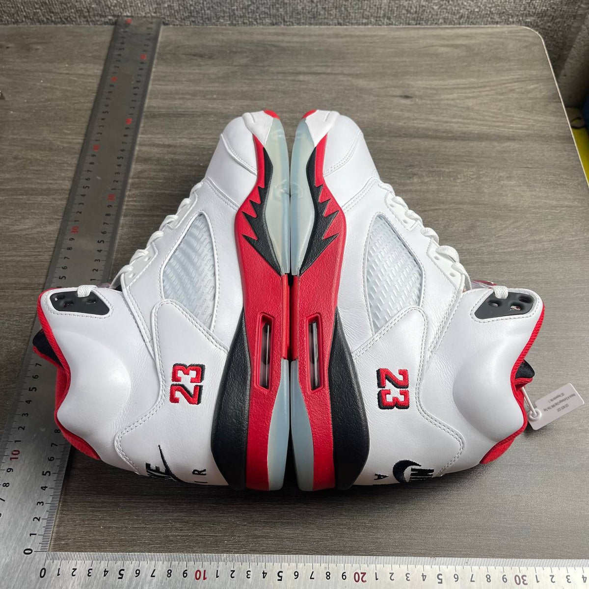 AJ5 Fire Red Black Tongue