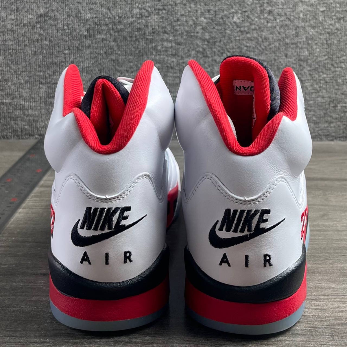 AJ5 Fire Red Black Tongue