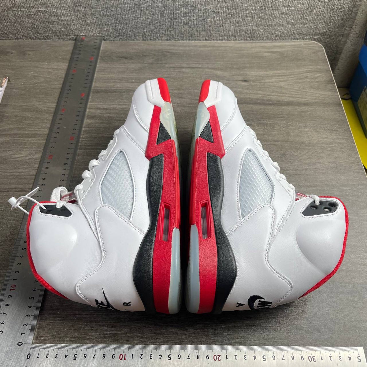 AJ5 Fire Red Black Tongue